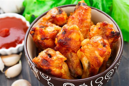 simsearch:400-05708291,k - Delicious baked chicken wings in a bowl Stock Photo - Budget Royalty-Free & Subscription, Code: 400-07425443