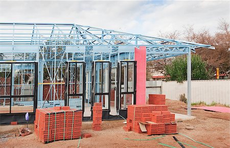 simsearch:400-05344387,k - New home under construction using steel frames against a blue sky Stock Photo - Budget Royalty-Free & Subscription, Code: 400-07425486