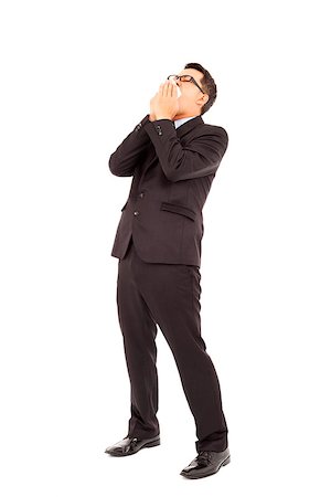 businessman is sneezing with bending body Stock Photo - Budget Royalty-Free & Subscription, Code: 400-07425947