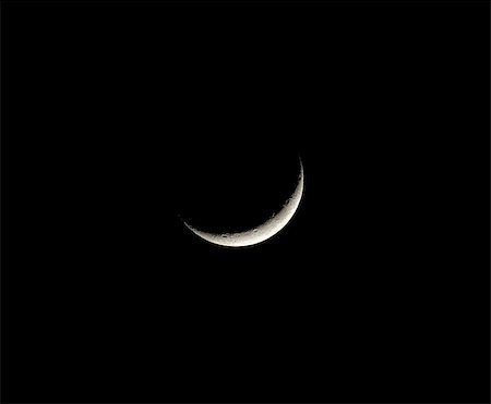 Waxing Crescent Moon with craters Stock Photo - Budget Royalty-Free & Subscription, Code: 400-07426011