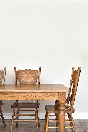 Wooden Dining room table and chair details and blank wall for your text, image or logo. Stock Photo - Budget Royalty-Free & Subscription, Code: 400-07426735