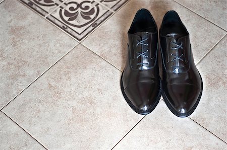 black shoes of the groom stand on a floor Stock Photo - Budget Royalty-Free & Subscription, Code: 400-07427110