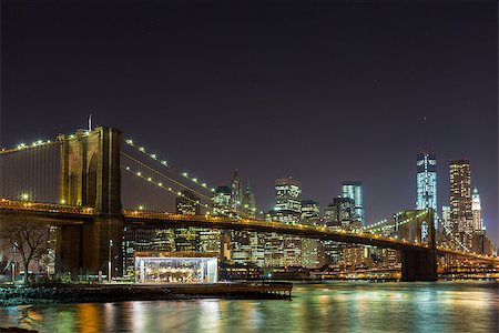 Brooklyn Bridge at night with Lower Manhattan in background. Foto de stock - Super Valor sin royalties y Suscripción, Código: 400-07427248