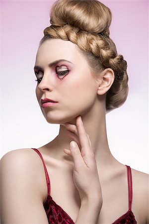 close-up portrait of beauty blonde woman with creative hair-style, red dress and valentines heart shaped make-up. Romantic concept Photographie de stock - Aubaine LD & Abonnement, Code: 400-07427694