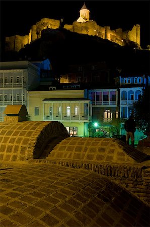 simsearch:400-05705183,k - Abanotubani is the ancient district of Tbilisi, Georgia, known for its sulfuric baths. Baths and fortress Naricala are illuminated in night. Stock Photo - Budget Royalty-Free & Subscription, Code: 400-07428101