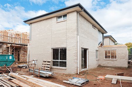 simsearch:400-05344387,k - new home currently under construction against blue sky Stock Photo - Budget Royalty-Free & Subscription, Code: 400-07428552