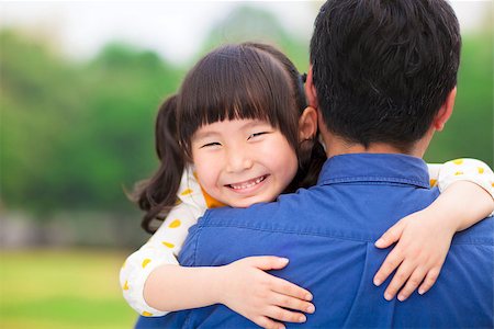 simsearch:400-07715953,k - happy little girl hugging embracing her father Stock Photo - Budget Royalty-Free & Subscription, Code: 400-07429136