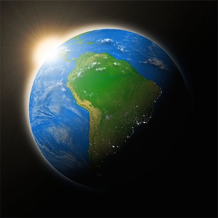 simsearch:400-08371074,k - Sun over South America on blue planet Earth isolated on black background. Highly detailed planet surface. Elements of this image furnished by NASA. Fotografie stock - Microstock e Abbonamento, Codice: 400-07429187