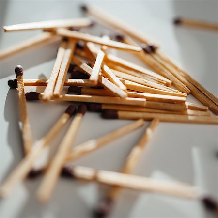 Matches scattered around on a table - concept of scurity Stock Photo - Budget Royalty-Free & Subscription, Code: 400-07429716