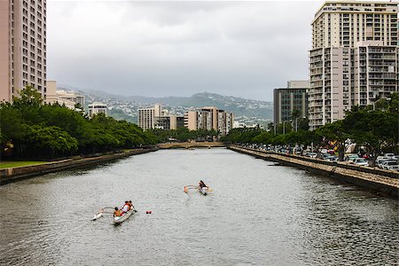 Popular canoe racing along the Ala Wai canal close to Waikiki. Stock Photo - Budget Royalty-Free & Subscription, Code: 400-07429794
