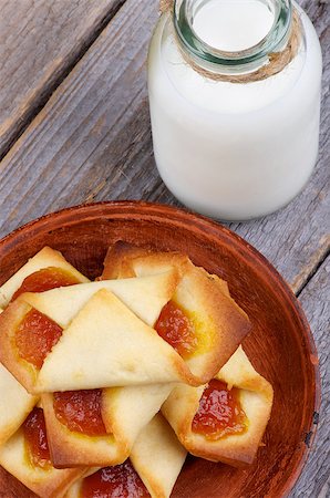 simsearch:400-07420117,k - Homemade Pastry Jam Wrapped and Bottle of Milk closeup on Rustic Wooden background. Top View Stock Photo - Budget Royalty-Free & Subscription, Code: 400-07420117