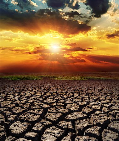 earth cloud cover - dramatic sunset over drought land Stock Photo - Budget Royalty-Free & Subscription, Code: 400-07420149