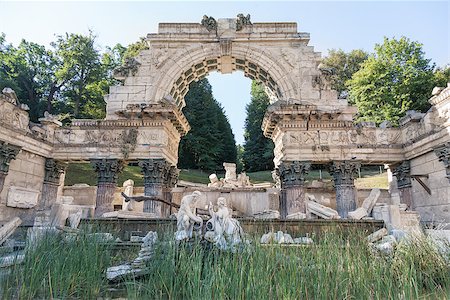 Originally called the Ruin of Carthage, the Roman Ruin stands at the foot of the wooded slopes of Schönbrunn Hill, Schonbrunn Palace, Vienna, Austria Stock Photo - Budget Royalty-Free & Subscription, Code: 400-07420496