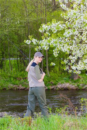 simsearch:400-06852239,k - woman fishing by the river in spring Photographie de stock - Aubaine LD & Abonnement, Code: 400-07420555