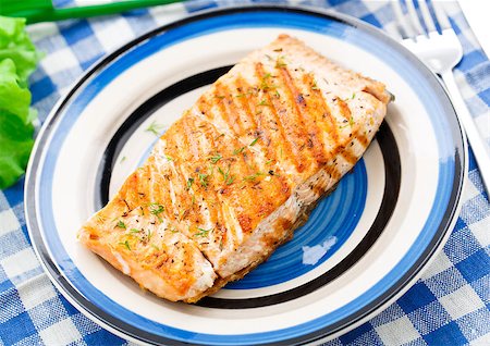 roasted fish - Delicious grilled salmon fillete on a plate Stock Photo - Budget Royalty-Free & Subscription, Code: 400-07420585