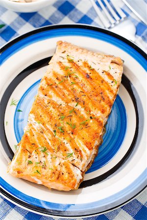 roasted fish - Delicious grilled salmon fillete on a plate Stock Photo - Budget Royalty-Free & Subscription, Code: 400-07420587