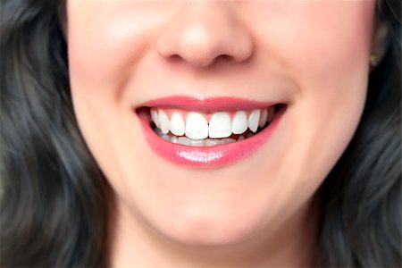 Clouseup of smiling woman with lips, teeth, mouth and nose Stock Photo - Budget Royalty-Free & Subscription, Code: 400-07421172