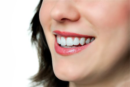 simsearch:400-04287911,k - Clouseup of smiling woman with lips, teeth, mouth and nose Photographie de stock - Aubaine LD & Abonnement, Code: 400-07421173