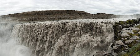 simsearch:400-07756743,k - Dettifoss is the most powerful waterfall on Iceland and in the whole Europe. It is located in Jokulsargljufur National Park the northeasten Iceland on the river Jokulsa a Fjollum. Panorama Foto de stock - Super Valor sin royalties y Suscripción, Código: 400-07421197