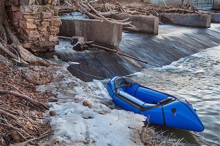 a packraft (one-person light raft used for expedition or adventure racing) below a diversion dam  - Cache la Poudre River, Fort Collins, Colorado Stock Photo - Budget Royalty-Free & Subscription, Code: 400-07421417