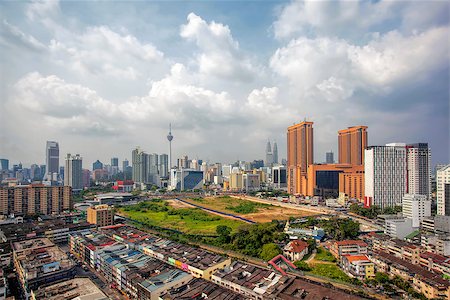 Kuala Lumpur Malaysia Central Cityscape with Old Neighborhood Houses Against Cloudy Blue Sky Stock Photo - Budget Royalty-Free & Subscription, Code: 400-07421533