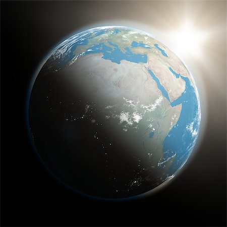 simsearch:400-08427636,k - Space view of the sun rising over Africa on blue planet Earth. Elements of this image furnished by NASA. Foto de stock - Super Valor sin royalties y Suscripción, Código: 400-07421830