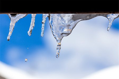 Ice stalactite pending with drop Stock Photo - Budget Royalty-Free & Subscription, Code: 400-07421990