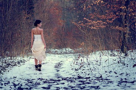 people with forest background - Lonely girl in white beautiful lace dress walking in a forest Stock Photo - Budget Royalty-Free & Subscription, Code: 400-07423260