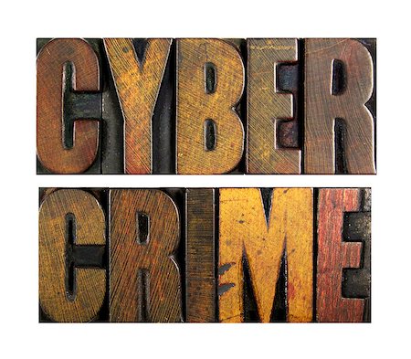 simsearch:400-07423443,k - The words CYBER CRIME written in vintage letterpress type Fotografie stock - Microstock e Abbonamento, Codice: 400-07423398