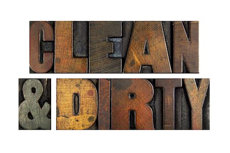 The words CLEAN AND DIRTY written in vintage letterpress type Stock Photo - Budget Royalty-Free & Subscription, Code: 400-07423392