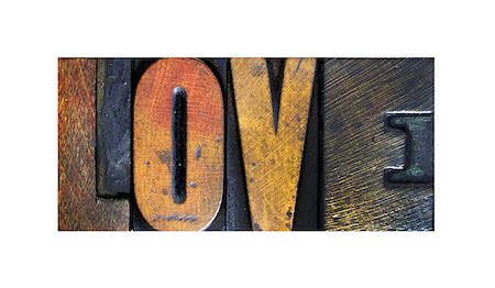 simsearch:400-07423443,k - The word LOVE written in vintage letterpress type Fotografie stock - Microstock e Abbonamento, Codice: 400-07423434