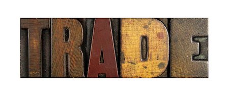 simsearch:400-07423443,k - The word TRADE written in vintage letterpress type Fotografie stock - Microstock e Abbonamento, Codice: 400-07423466