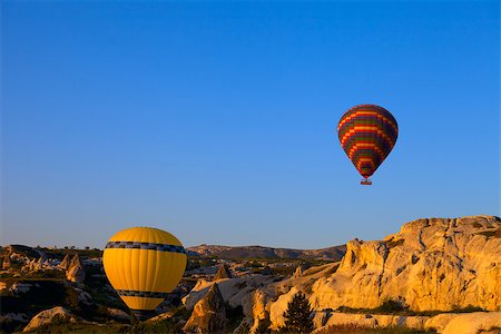 Hot air balloons in early morning. Turkey, Cappadocia, Goreme. Photographie de stock - Aubaine LD & Abonnement, Code: 400-07430043