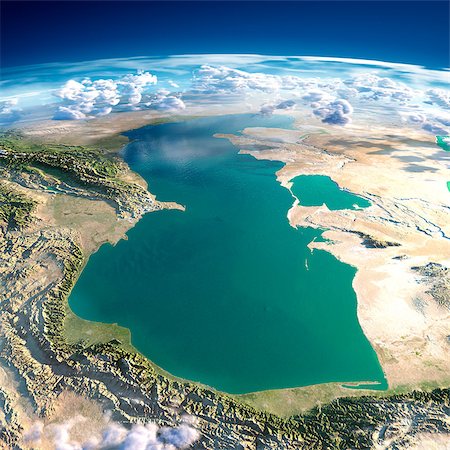 Highly detailed fragments of the planet Earth with exaggerated relief, translucent ocean and clouds, illuminated by the morning sun. Caspian Sea. Elements of this image furnished by NASA Stock Photo - Budget Royalty-Free & Subscription, Code: 400-07430182