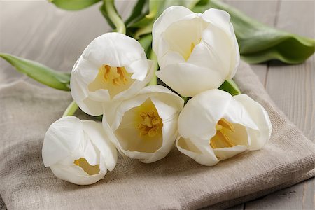 white tulips on old wood table, spring flowers Stock Photo - Budget Royalty-Free & Subscription, Code: 400-07430249