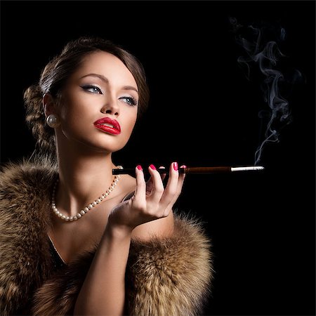 Vintage, retro. Gorgeous woman with a cigarette Stock Photo - Budget Royalty-Free & Subscription, Code: 400-07430387