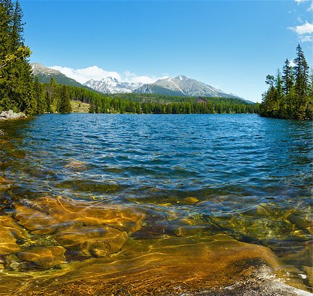 simsearch:400-07406491,k - Mountain lake Strbske Pleso spring view (Slovakia). Photographie de stock - Aubaine LD & Abonnement, Code: 400-07430632