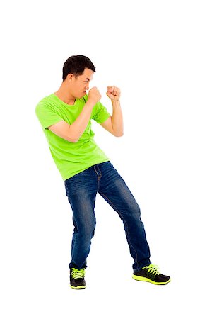 simsearch:400-07481076,k - young man imitate boxing ready pose Photographie de stock - Aubaine LD & Abonnement, Code: 400-07431037
