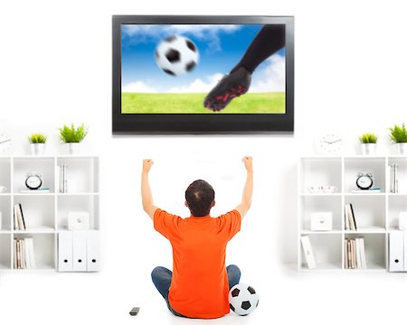 shouting television - happy fan watching soccer game and raised hands Stock Photo - Budget Royalty-Free & Subscription, Code: 400-07431077