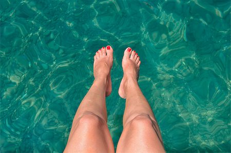 Nice women legs under the water in the sea Stock Photo - Budget Royalty-Free & Subscription, Code: 400-07445147