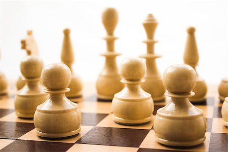 simsearch:400-04398584,k - Chess pieces on a board in different compositions. Fotografie stock - Microstock e Abbonamento, Codice: 400-07445849