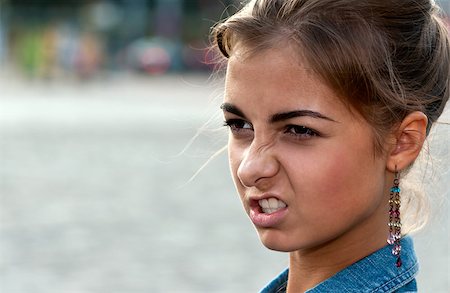 simsearch:400-04622088,k - portrait of beautiful girl in the denim vest in the square Stock Photo - Budget Royalty-Free & Subscription, Code: 400-07446394