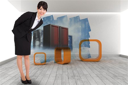 simsearch:400-07448077,k - Smiling businesswoman bending against abstract screen in room showing server towers Fotografie stock - Microstock e Abbonamento, Codice: 400-07446697