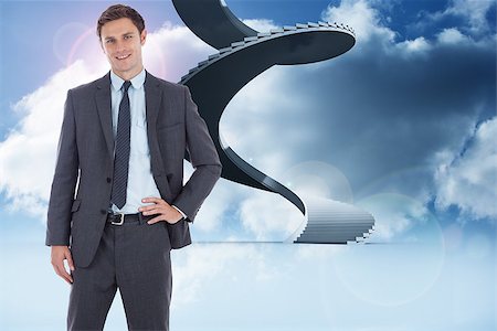 person on winding stairs - Smiling businessman with hand on hip against winding staircase in the sky Stock Photo - Budget Royalty-Free & Subscription, Code: 400-07446987