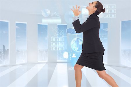 simsearch:400-07277816,k - Angry businesswoman gesturing against global business hologram Fotografie stock - Microstock e Abbonamento, Codice: 400-07446994