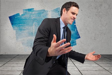 simsearch:400-07344883,k - Businessman posing with arms out against display on wall showing data graphic Stock Photo - Budget Royalty-Free & Subscription, Code: 400-07447127