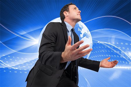 simsearch:400-07344883,k - Businessman posing with arms out against global technology background Stock Photo - Budget Royalty-Free & Subscription, Code: 400-07447419