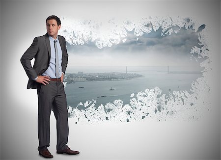 serious hip businessman - Serious businessman with hands on hips against splash on wall revealing cityscape Stock Photo - Budget Royalty-Free & Subscription, Code: 400-07447675