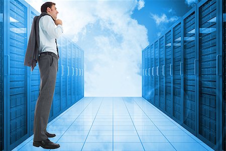 simsearch:400-07448129,k - Smiling businessman holding his jacket against server hallway in the blue sky Stock Photo - Budget Royalty-Free & Subscription, Code: 400-07447750