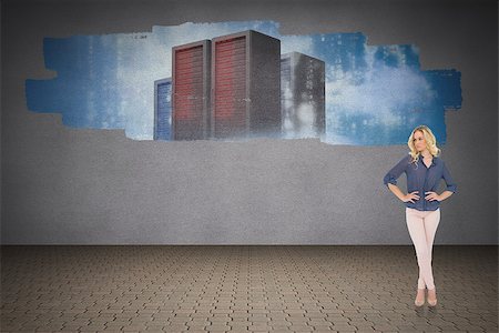 simsearch:400-07447273,k - Thoughtful gorgeous blonde wearing classy clothes posing against display on wall showing server towers Stock Photo - Budget Royalty-Free & Subscription, Code: 400-07448101